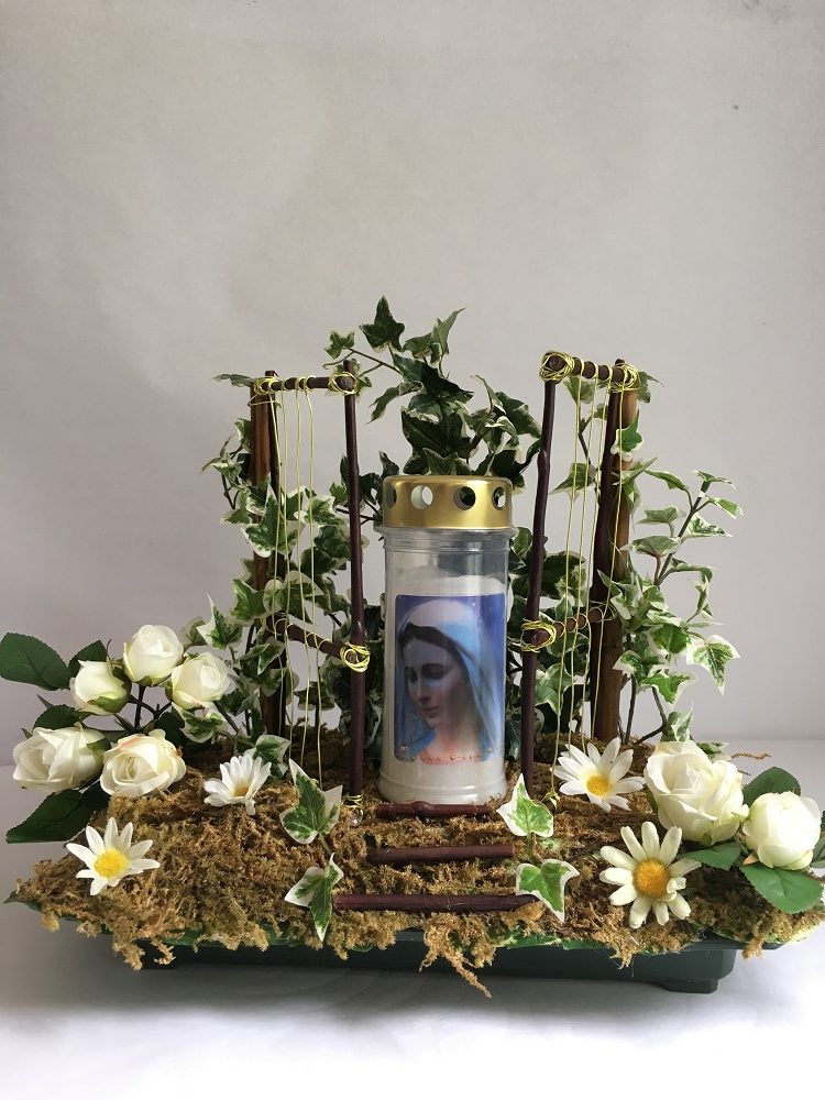 article funeraire fleur et bougie